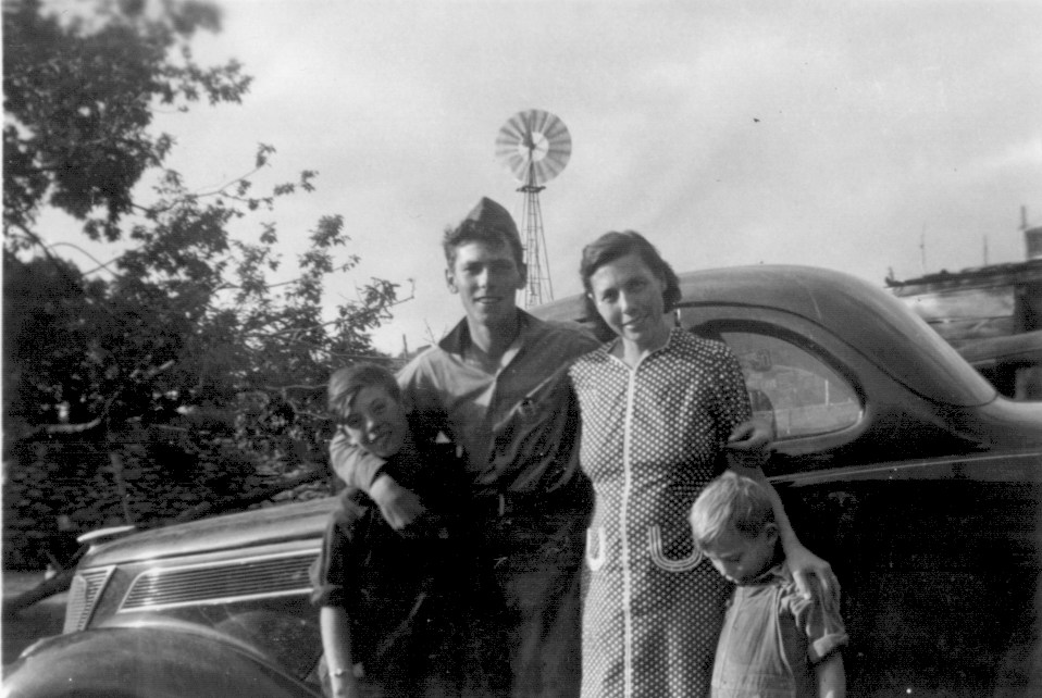 Gene and Norman Norwood; Maude [Black] Bates; and John Norwood. Bates ranch